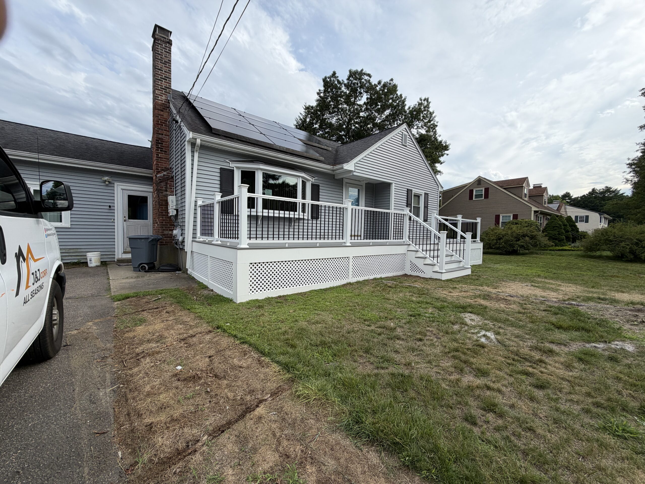 Front porch and deck built by J&J All Seasons Corp in Massachusetts