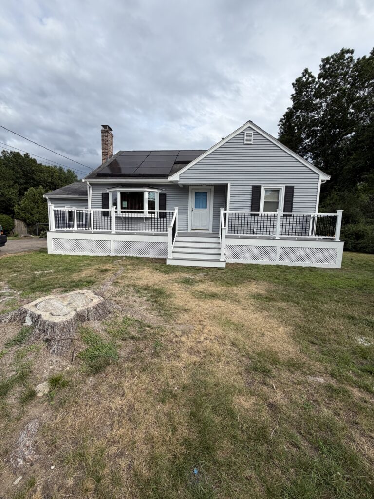 Exterior view of new deck and porch built by J&J All Seasons Corp
